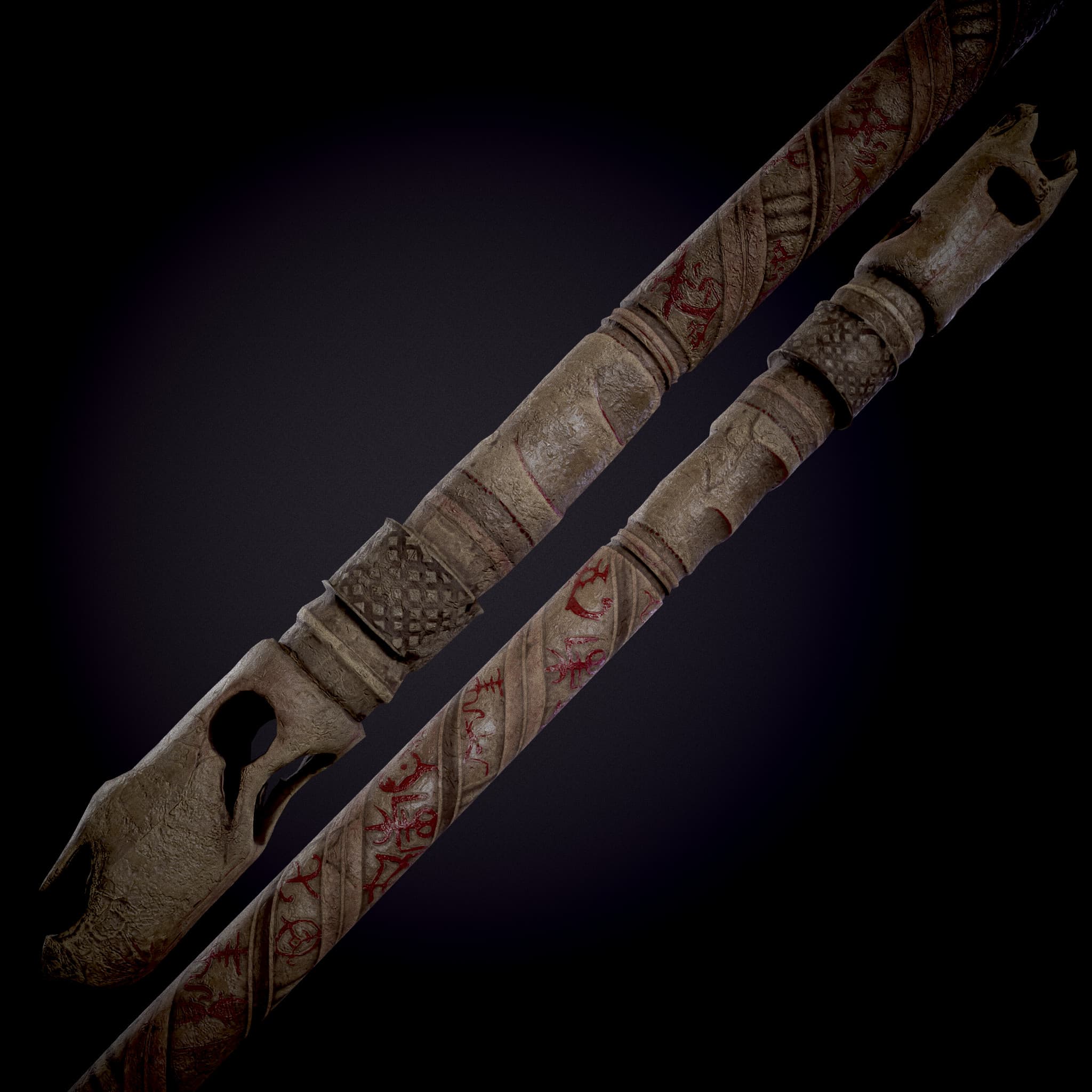 Two views of an engraved bone artifact with animal skull tips and red markings.